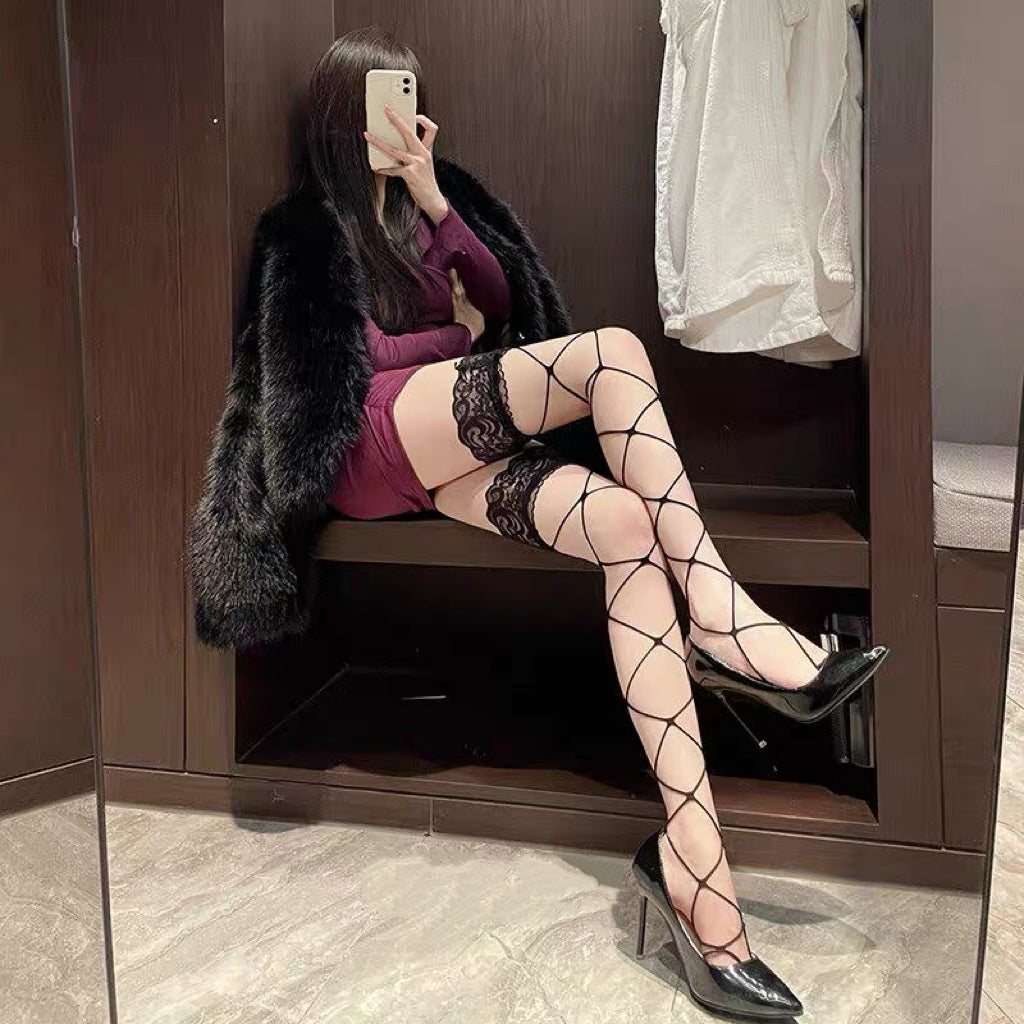 Lace top fishnet stockings over knee black hosiery
